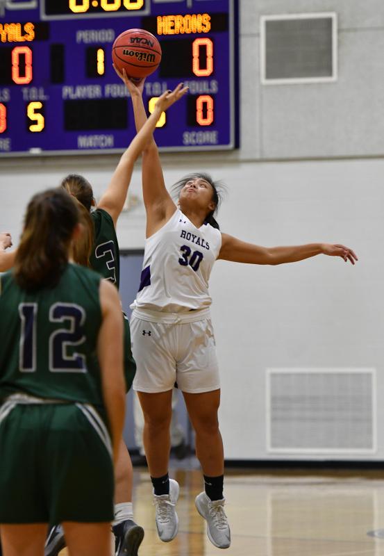 Senior Mara Agapito wins the opening tip.