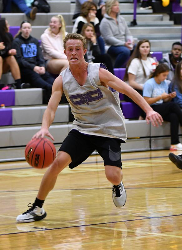 Royals senior guard Seth Stevens drives to the paint.