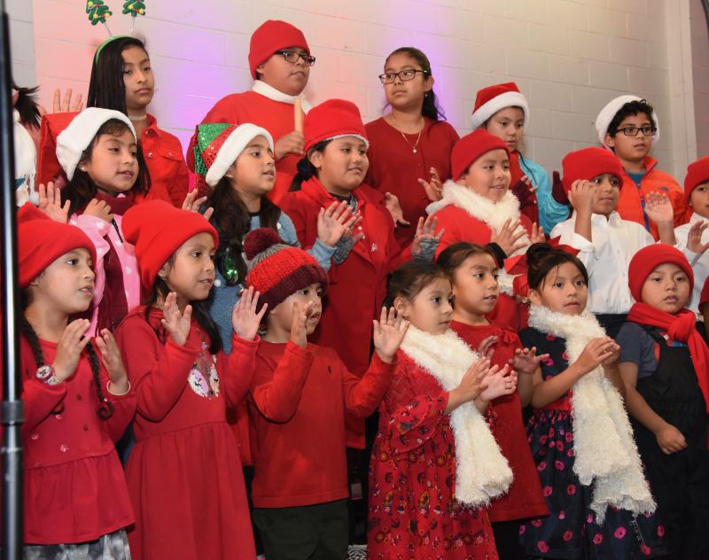 The Children’s Choir of St. Michael’s Church in Georgetown is always the highlight of Caroling on The Circle. RON MACARTHUR PHOTOS
