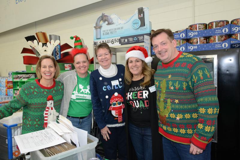 SCAOR board members organizing the shoppers at Walmart are (l-r) Brigit Taylor, Adriane Gallagher, Kathy Douglas, Josette Castiglione, and Board President Joe Della Torre. SCAOR Community Foundation