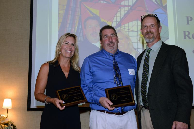 Rehoboth Toy & Kite Co. was named the 2019 Business of the Year by the Rehoboth Beach-Dewey Beach Chamber of Commerce. Chamber board member Chris Weeks, right, presents the plaques to business owners Rachel Webster and Bee Linzey during the chamber’s annual awards banquet Dec. 4. STEVEN BILLUPS PHOTOS