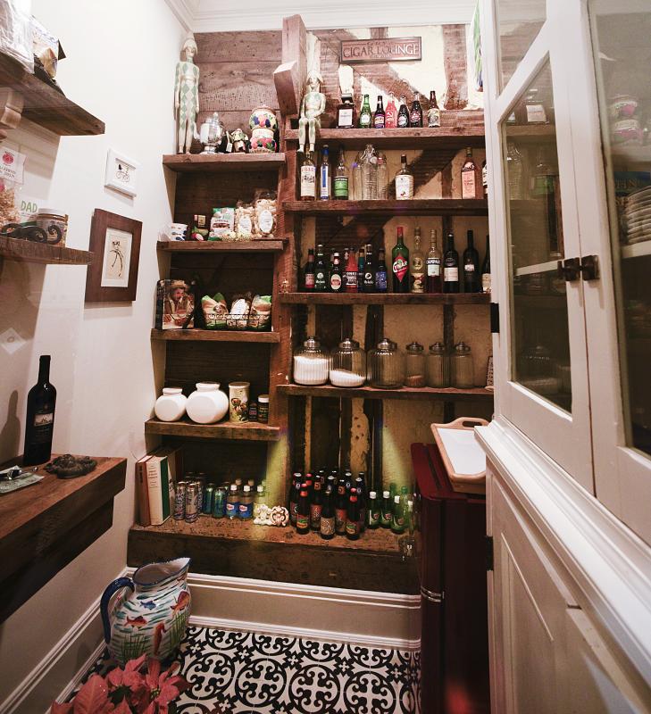 A pantry in this Kings Highway home features an exposed wall that was part of the original 1871 kitchen.