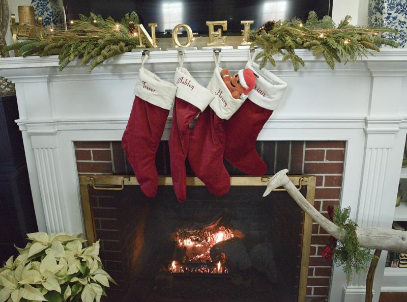 This 1927 Savannah Road home keeps true to its roots. The original fireplace is a backdrop for family Christmas stockings.