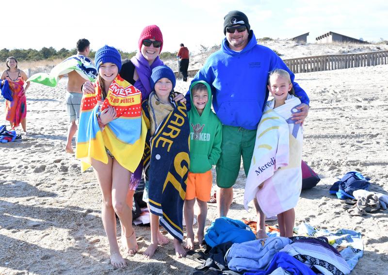 The Frederick family jumps together each New Year’s Day. Shown are (l-r) Lina, Suzannah, Will, James, Jack and Meredith Frederick.