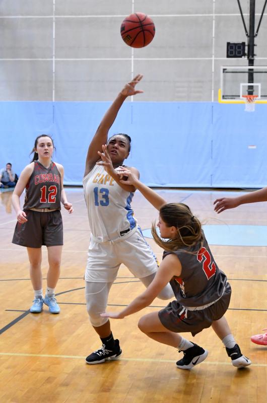 Mehkia Applewhite is fouled going to the hoop.