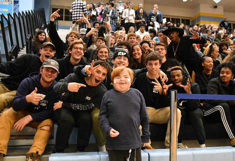 Beau Smith leads the Cape student section in a fourth-quarter cheer.