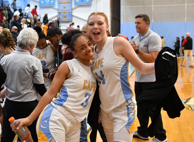 Dania Cannon, left, and Morgan Mahoney celebrate the big win.
