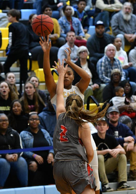 Mehkia Applewhite hits a three.