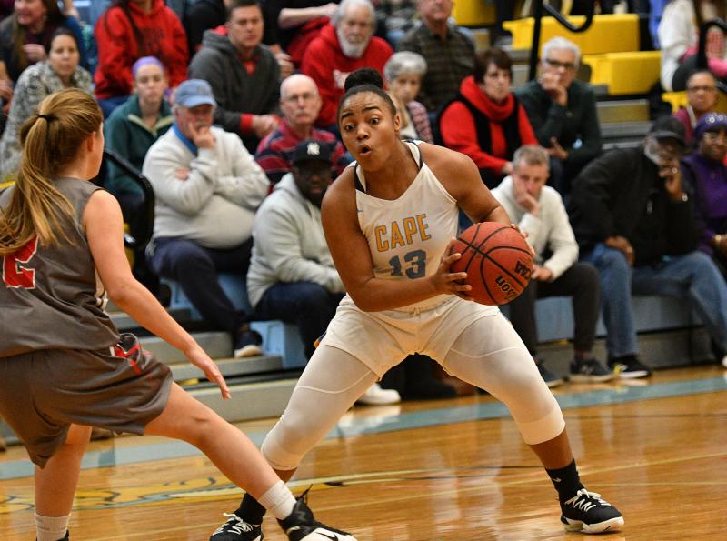 Cape’s Mehkia Applewhite puts a move on Conrad’s Erin Ranegan.