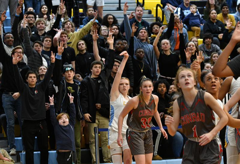 The Vikings student section celebrates a three by Morgan Mahoney.