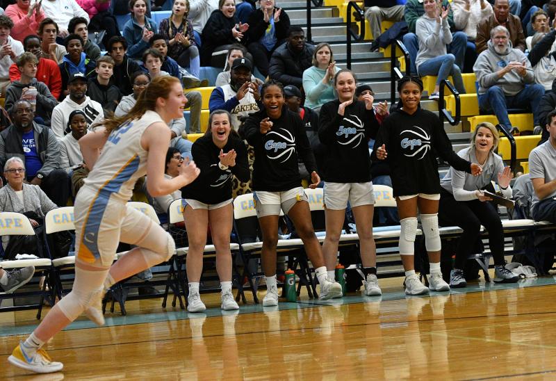 The Cape bench goes wild after Abbey Hearn hits a three.