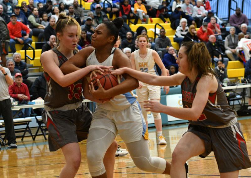 Mehkia Applewhite is fouled going to the hoop.
