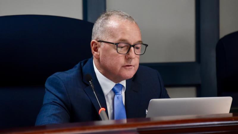 During a Jan. 7 meeting, Sussex County Councilman Doug Hudson reads a motion for denial of a conditional-use application for a 7-Eleven convenience store. RON MACARTHUR PHOTOS
