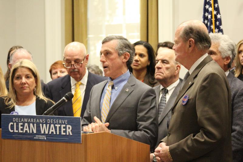 Gov. John Carney announces plans to add $50 million from his budget to a clean water trust. Flanking Carney (l-r) are House Majority Leader Valerie Longhurst, D-Bear, Jeffrey Bross, chairman Water Infrastructure Advisory Council, and Senate President Pro Tempore Sen. David McBride, D-New Castle. MELISSA STEELE PHOTOS