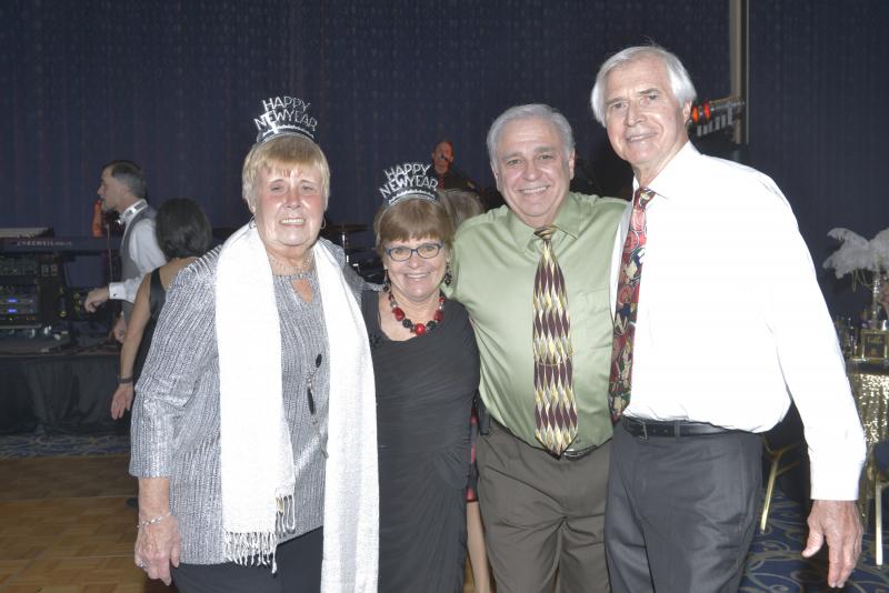 Pausing for a photo during the band’s break are (l-r) Peggy Comer Ford, Patricia Granthay, Joe Peralta, and Rany Simms. Atlantic Sands 2020