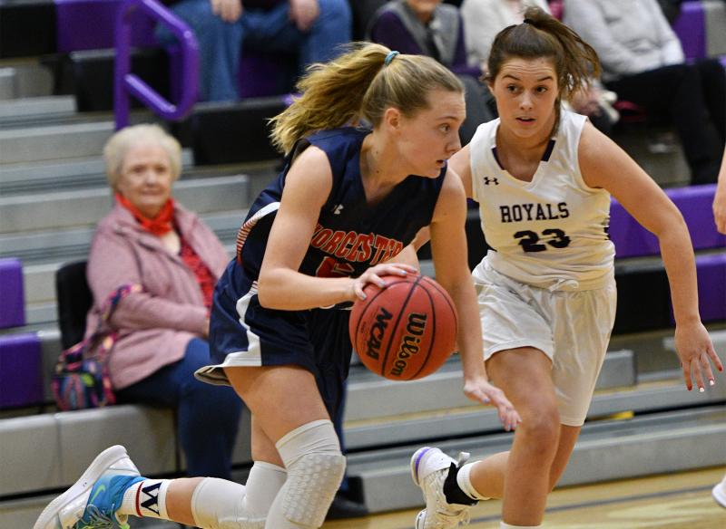 Worcester’s Lily Baeurle speeds the ball past Royals guard Grace Fetterman.