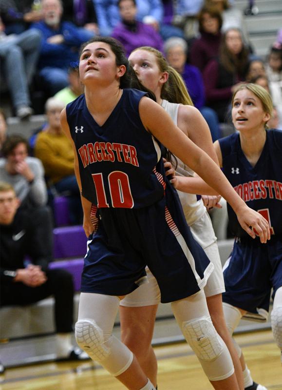 Mallards forward CC Lizas boxes out Royals sophomore Sierra Troyer.