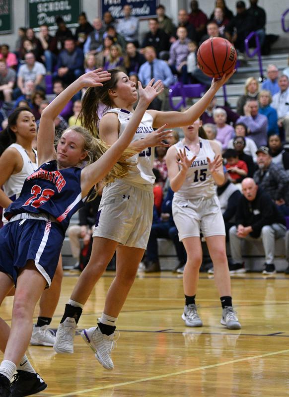Royals junior point guard Grace Fetterman splits the Mallards defense and hits a lay-in.