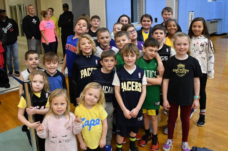 Young players from the Factory basketball league attended the game to show their support for the Lady Vikings.