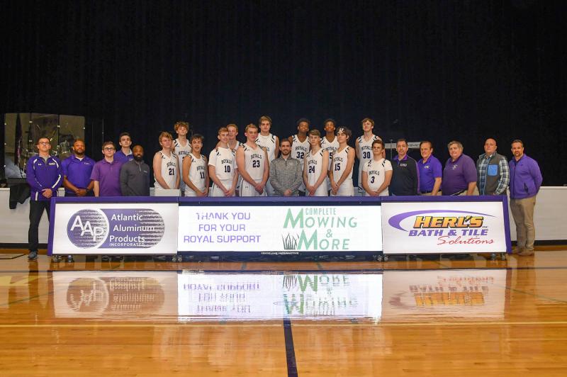The Delmarva Christian athletic department added a new scorer’s table to the school with donations from local businesses. Shown are (l-r) Athletic Director Jim Berger, assistant coach Cordea Showell, Max Kichkline, Brendan Sherman, Martez Hagans, Andrew Workman, Gabe Herling, Nathan Moyer, Carter Breasure, Seth Stevens, Chris Vonhof, Brayden Stonebraker, head coach Micah Twedell, Jeremiah Hannah, Zach Smith, Lou Fleurima, Chase Hesson, Riley Briggs, Wyatt Kwiatkowski, assistant coaches Keith Stonebraker and Lynn Moore, Director of Athletic Operations Jeff Mohr, Herl’s Bath and Tile Solution President Greg Herling and Principal Matt Kwiatkowski.