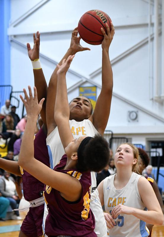 Sophomore forward Mehkia Applewhite snags a rebound in the first quarter of the win over the Bucs. She garnered nine points and grabbed four rebounds.
