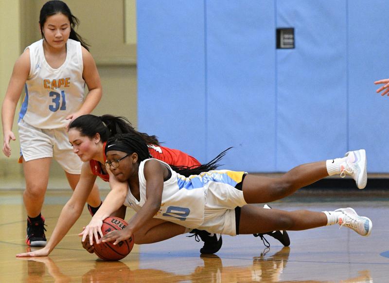 Cape junior varsity guard Ja'Onna Lee makes a diving play for possession with a JV Red Wolves player in the Vikings’ 43-14 JV win. She finished with 11 points in the JV victory. The JV Vikings are 11-0 this season.