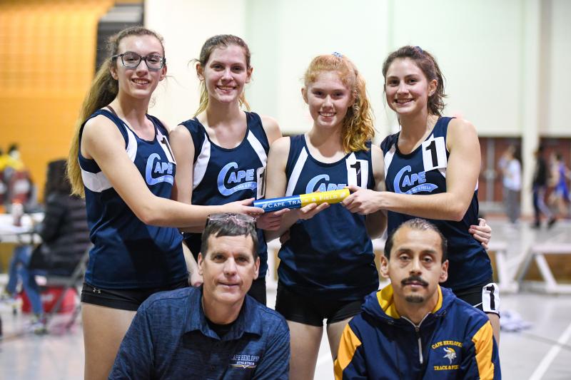 Katie Kuhlman, Taylor Johnson, Elizabeth Melson and Olivia Brozefsky ran a season-best time of 10:08 in the 4-by-800. In front are Tim Bamforth and Martin Rodriguez.