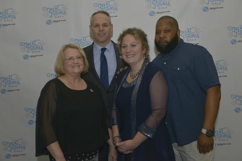 Boys & Girls Club officers gather for a photo. Shown are (l-r) Southern Region Vice President of Operation Milli Charnick, President and CEO of Delaware Boys & Girls Club John Wellons, Oak Orchard Boys & Girls Club Unit Director Erica Kennedy, and Oak Orchard Boys & Girls Club Program Manager C.J. Pitts. Great Futures Gala 2020