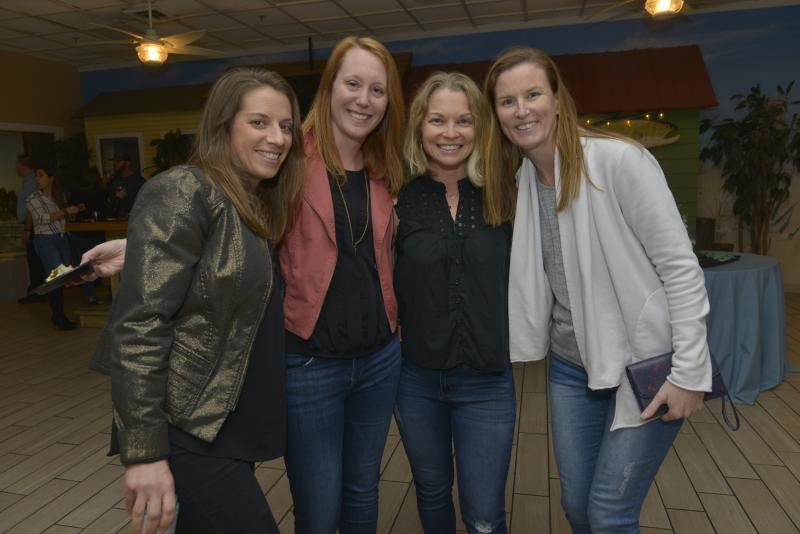 Enjoying the event are (l-r) Becca Neufield, Carrie Curry, board member Melissa Clampitt, and District Office Specialist Eileen Baker. CHEF Winter Jam 2020