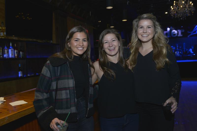 Waiting for the band to start performing are (l-r) Joanna Petrosky, sponsor Dogfish Head representative Christine Bristowe and Cape girls basketball Assistant Coach Jacki Coveleski. CHEF Winter Jam 2020