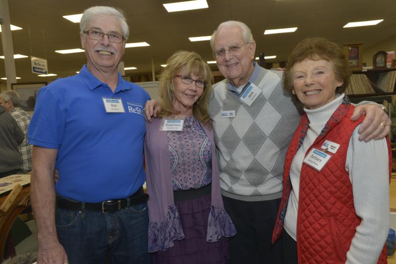 Volunteers (l-r) Senior Volunteer Bob Roche, ReStore decorator and designer Rosemary Lilly, Jenk Davis, and Barbara Pitman gather for a photo. SCHFH Winter Reception
