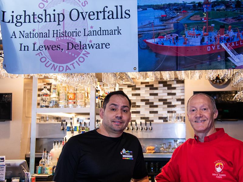 Preparing for the Feb. 20 Overfalls Foundation fundraiser are Eddie Adams, left, Diego’s Hideaway co-owner, and Michael Safina, Overfalls Foundation volunteer. SUBMITTED PHOTO