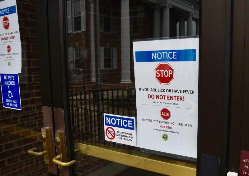 Even with drop offs of documents only, Sussex County officials are monitoring everyone who comes into the county administration office lobby on The Circle in Georgetown. Personal contact with staff is not permitted. RON MACARTHUR PHOTOS