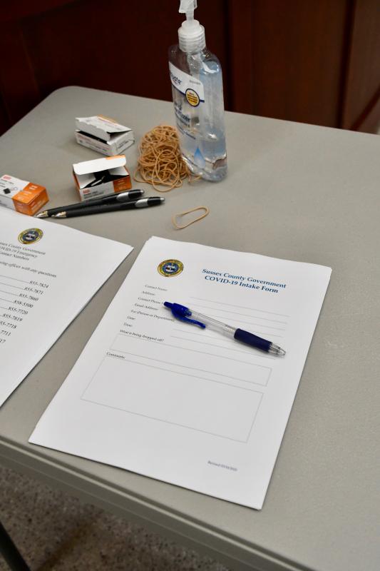 People needing to do land-use business with Sussex County can fill out a form at a station set up in the administration office lobby.