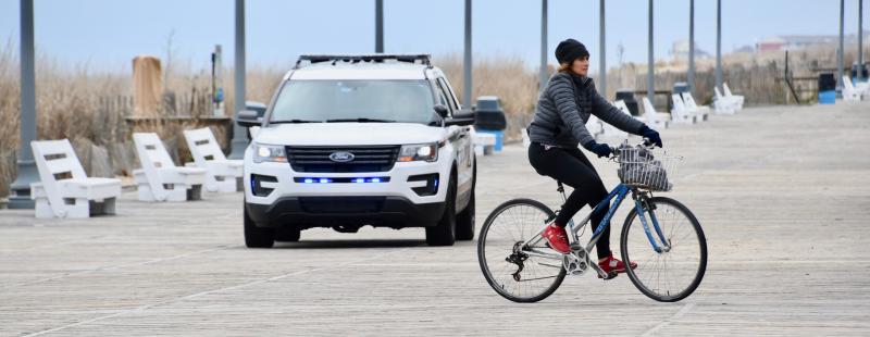 This cyclist’s ride on the Boardwalk is cut short when she is told to leave by Rehoboth Beach police. RON MACARTHUR PHOTO