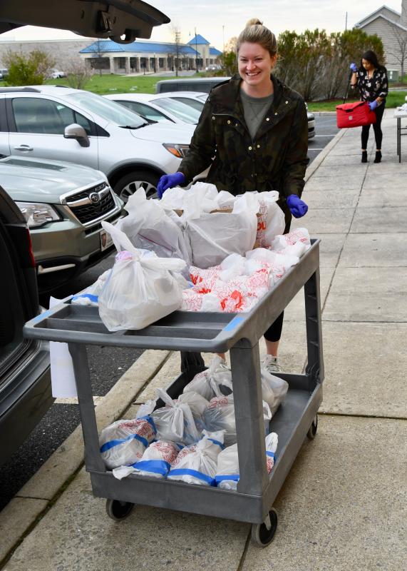 Volunteer Jenna Douglass, a teacher in Seaford, said while she is out of work, she wants to help others.