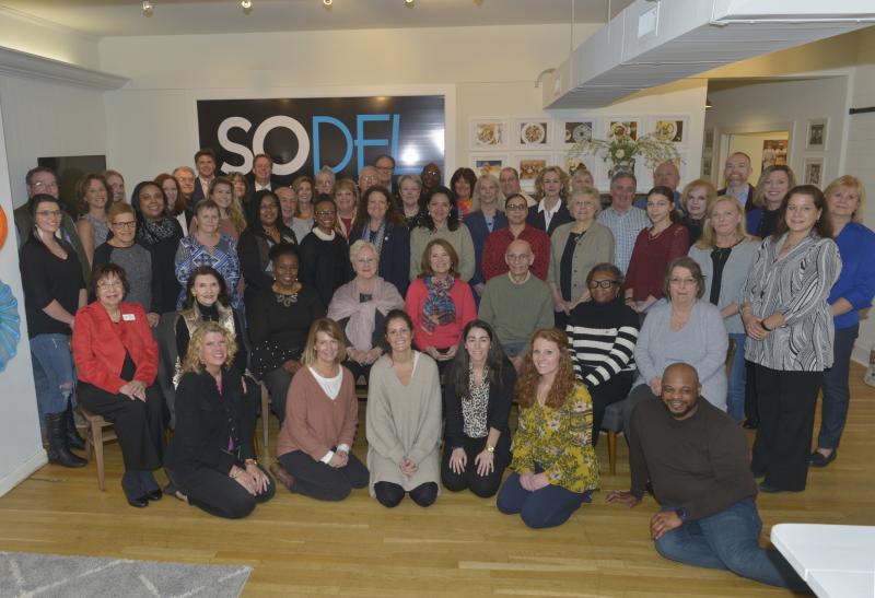 Gathered for the SoDel Cares check presentation in back are (l-r) John Wolfle, Sue Garson, Anna Seiffert, Andrea Finn, Louis Papp, Clay Serman, Barbara Greenway, Dave Humes, Stephanie Mastrangelo, Beth Weatherby, Art Payne, Tim Hunter, Ruthann Messick, Chad Robinson, Susan Crawford, Cpl. James Hatfield, James Spadole, Patti Grimes, and Donna Murawski.
In middle are Christine Salvato, Connie Kaden, Tamisha Hopkins, Brenda Baker, Jacki Coveleski, Barbara White, Harry Papaleo, Doris Griffin, Lana O’Hollaren, Jennifer Fuqua, Mary Anne Hoopes, Patricia Rivera, Jo Allegro-Smith, Kim Wright, Tarrie Miller, Sandy Scheibe, Mark Sievers, Autumn Wiltbank, Nancy Phillips, Betsy Plowman, and Michelle Whetzel.
Seated, second row are Sarah Gilmour, Mary Maloney, Fay Blake, Laura Glascoe, Clare MacDonald, Tom DiOrio, Brenda Milbourne, and Sally Beaumont.
In front are Stacy Penaranda, Kelly Loeser, Karen Kern, SoDel Cares President Lauren Herlihy, Casey Christophel, and Demaris Miller.
STEVEN BILLUPS PHOTO SoDel Cares awards grants
