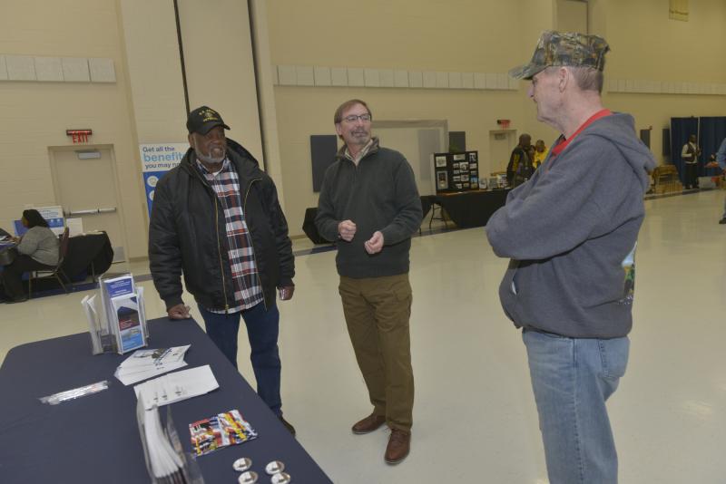 The State of Delaware Veterans Affairs Department had a display at the event. Discussing their military careers are (l-r) Heyward White, Veterans Affairs Acting Public Affairs Representative Don Bohn and Harvey West. CHEER Black Culture Day