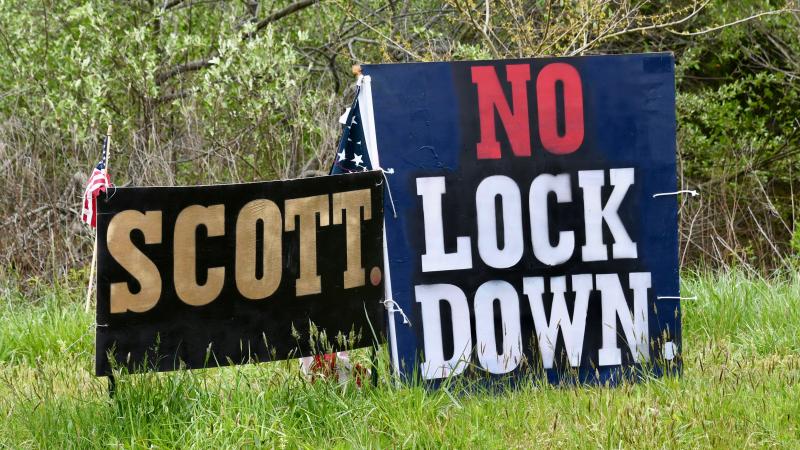 Scott Walker, a Republican running for U.S. Congress, has posted “No Lock Down” signs next to some of his campaign signs, such as this near Nassau Bridge. Walker has filed a lawsuit against Gov. John Carney for restrictions placed on businesses and residents due to the COVID-19 pandemic.