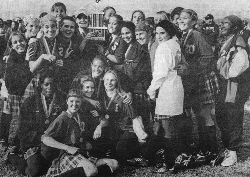 Members of the 1995 Cape Herilopen High School state championship field hockey team hoist their trophy
high in the air. Members of this year's team include: Holly Brock, Angel Cahill, Erin Ewart, Kelly Flaherty, Allison Gaffney, Allison Griffith, Leslie Kroon, Karinne Lemmon, Carrie Lingo, Christina Maull, Kelly Palekar, Amy Reardon, Jennifer Reihm, Shelley Sentman, Kim Smith, Nicole Starr, Shelly Swartzel, Alexia Waples, Jaclyn Warrington, Stephanie Warrington, and Emily Weer. ANGIE MOON PHOTOS