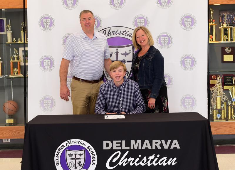 Royals senior Matt Jensen signs to play lacrosse at Delaware Tech in Dover. He was all-ESIAC in 2019. Shown with Matt are his parents Drew and Kim.
