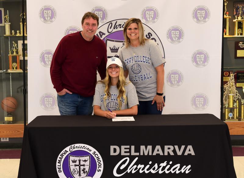 Savannah Stewart signs to play volleyball at Berry College in Mount Berry, Ga. Savannah was All-ESIAC this year in volleyball and also excelled in basketball. She was also on the softball squad. She is shown with her parents Jeff and Sherry.