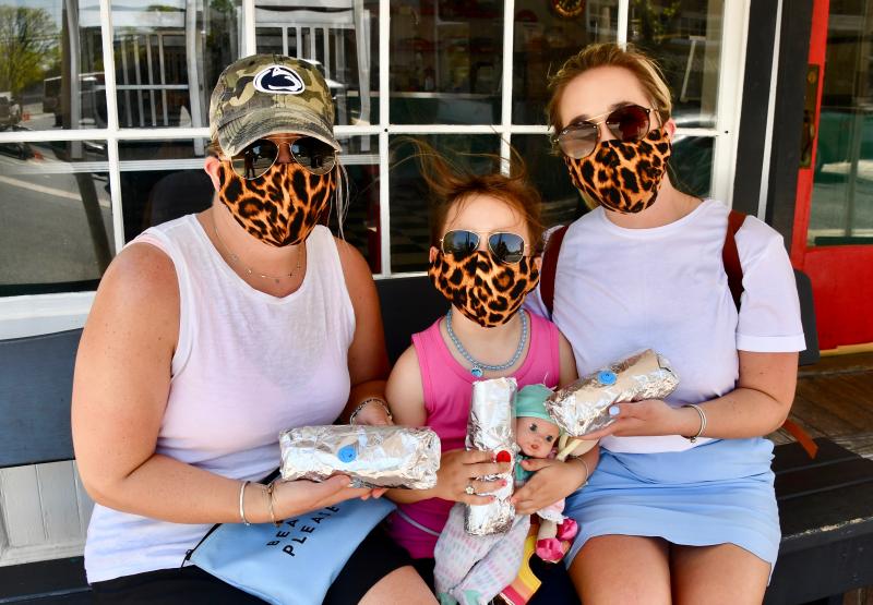 Getting ready to chow down on their burritos are (l-r) Julie and Amelia Young and Jamie Lewes, all of Lewes. RON MACARTHUR PHOTO