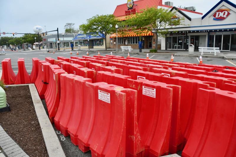 Early May 29, barricades are ready to be moved into position along Rehoboth Avenue. RON MACARTHUR PHOTO