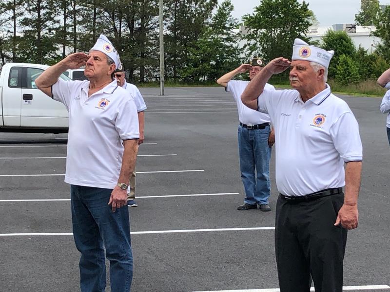 AmVets Delaware District Commander David Heffline, left, and Post 2 Commander Tom Jones salute the flag. RYAN MAVITY PHOTOS