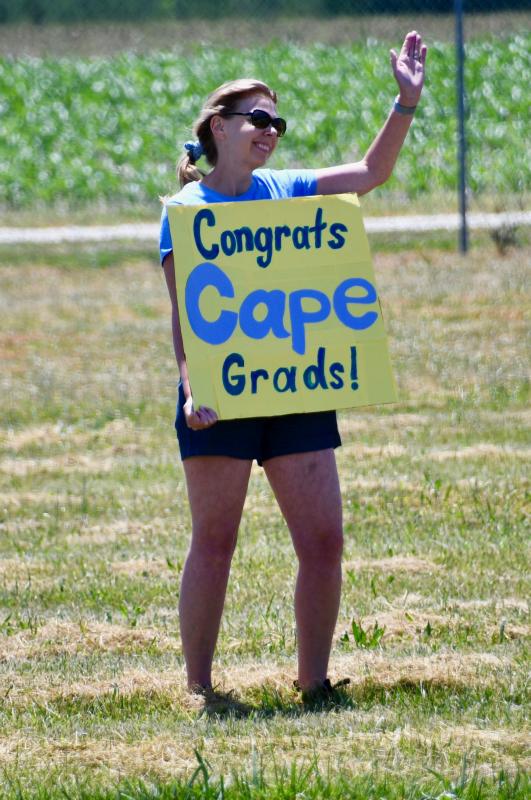 Jessica Hazzard, a district ELL specialist, joins with other teachers to congratulate the Cape High Class of 2020.