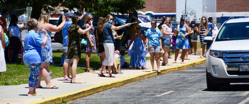 Shields Elementary staff celebrate their fifth-graders during a June 12 parade in front of the school. RON MACARTHUR PHOTO