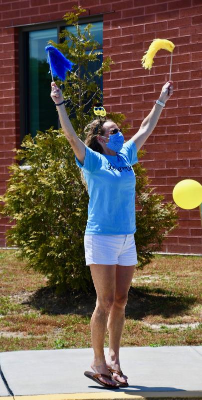 Love Creek Elementary paraprofessional Gretchen Wyshock is a cheerleader for fifth-graders. RON MACARTHUR PHOTO
