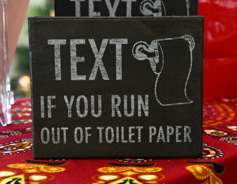 Many of the company’s signs reflect current events and issues. This toilet paper sign has been a huge seller.