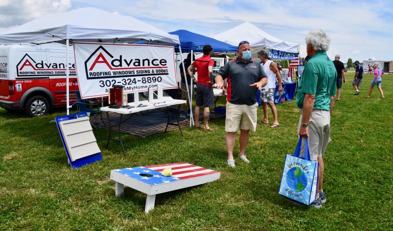 The Delaware Resorts Outdoor Home Expo offers businesses a chance to reach out to the public, as staff at Advance Roofing, Windows and Doors are doing.